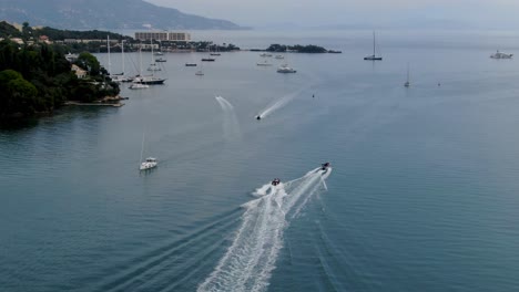 ships pass in komeno bay corfu island