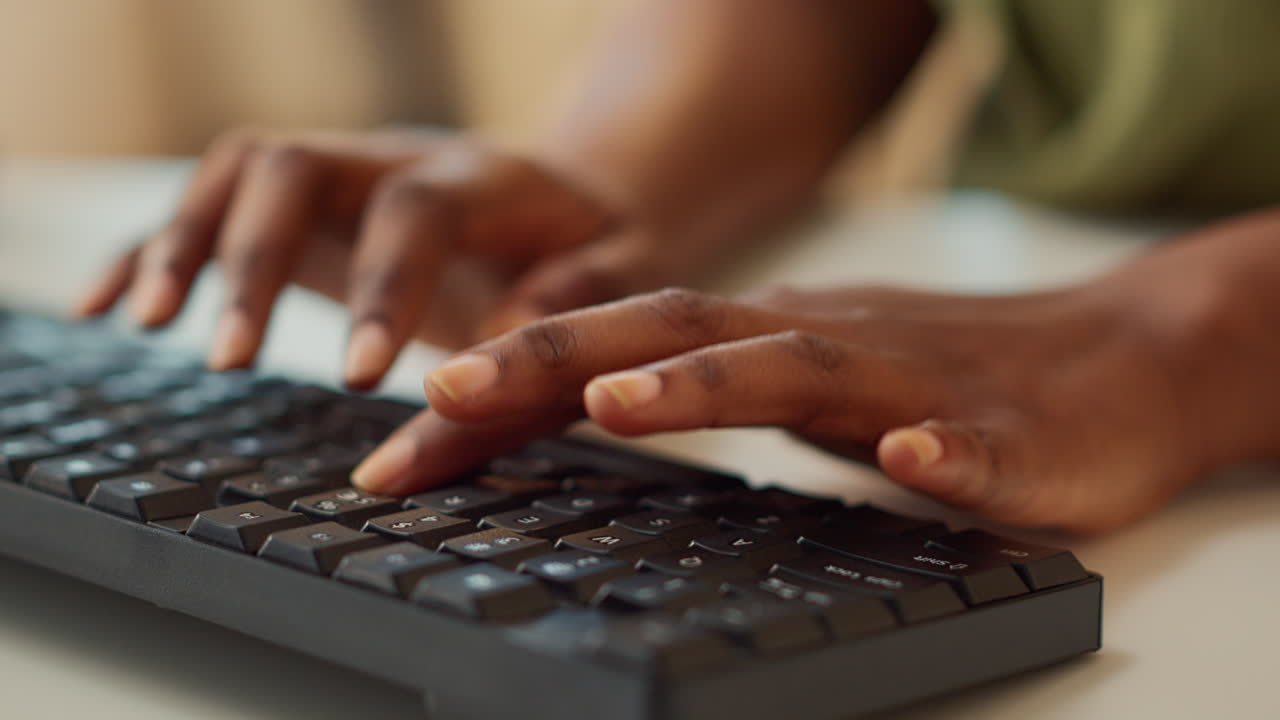 Manager typing data report on computer