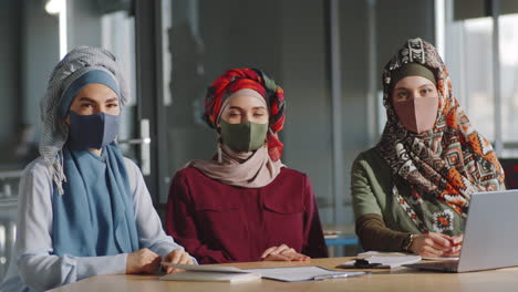 Portrait-of-Muslim-Female-Colleagues-in-Hijabs-and-Masks