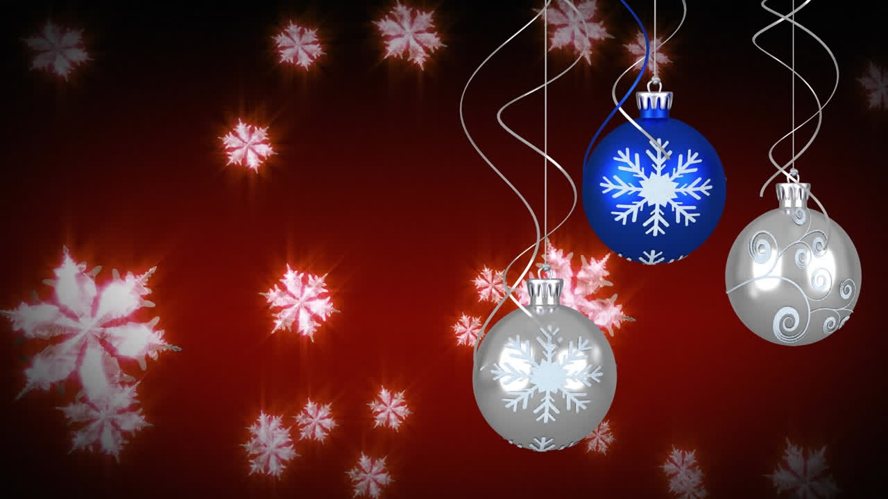 animación de bolas de navidad sobre la nieve que cae