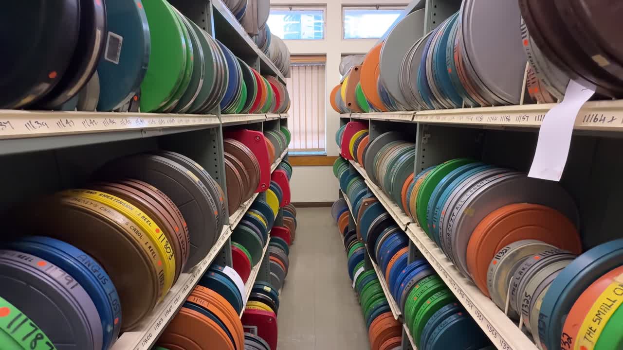 A large film archive with many films on the shelves