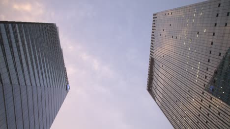 looking up between two skyscrapers time lapse