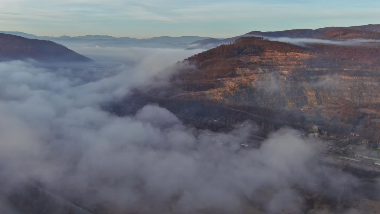Carpathian autumn mountains early morning fog on a mountain hill