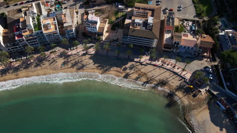 beach on tropical island mallorca port soller with waves, ocean and sand