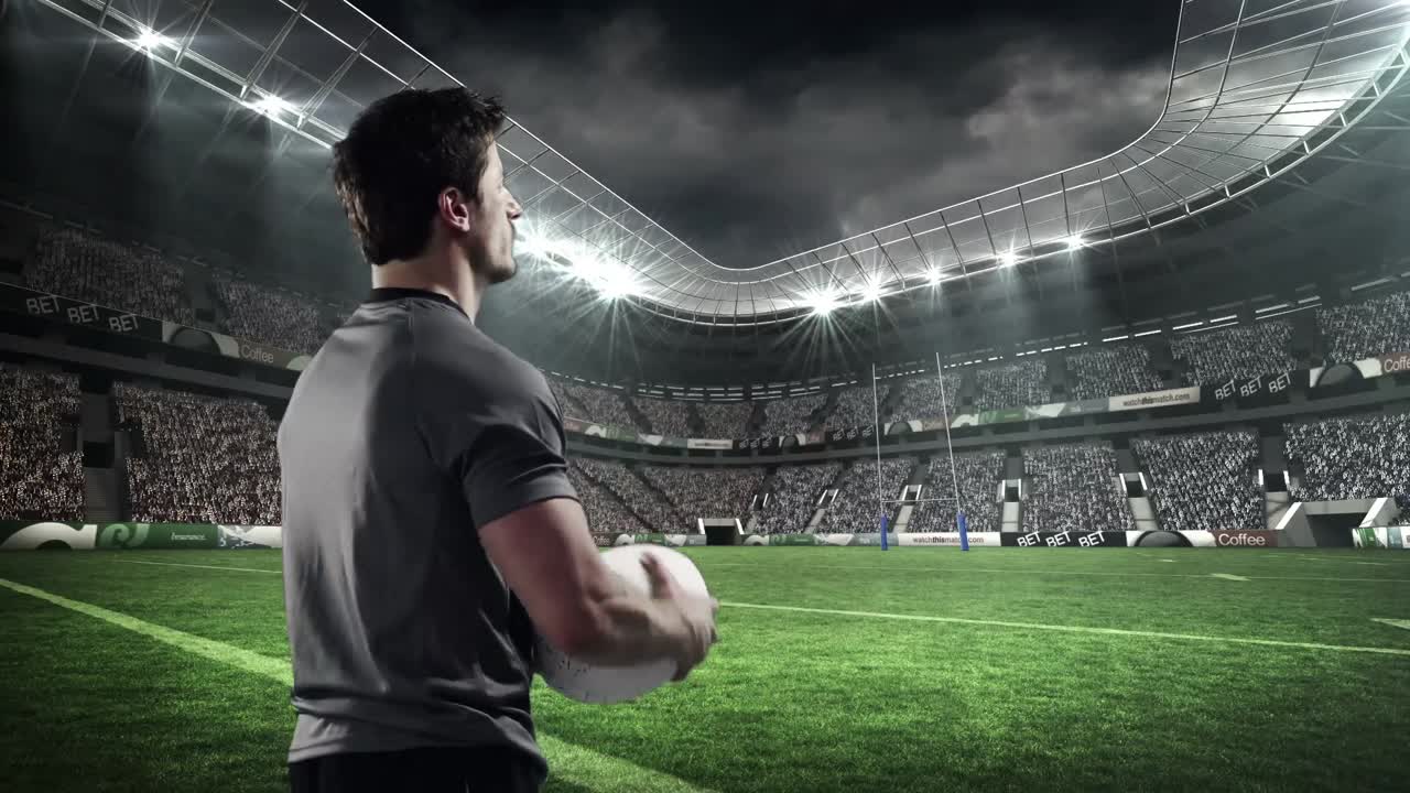 공을 들고 있는 심각한 럭비 선수