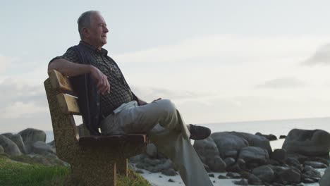 senior man sitting on a bench