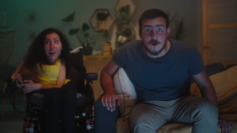 couple watching tv excitedly