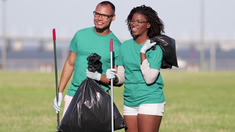 happy volunteers in park