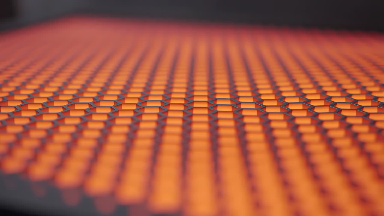 Dynamic Hexagonal Grid with Glowing Red and Orange Light