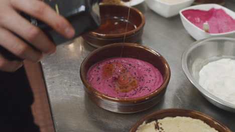 chef prepares mediterranean starter dish