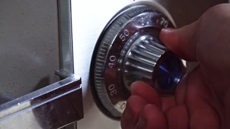 Opening-old-safe-combination-lock-turning-dials