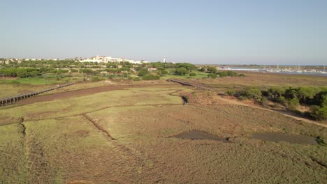 Marshes-at-sunset-next-to-port-and-fishing-village