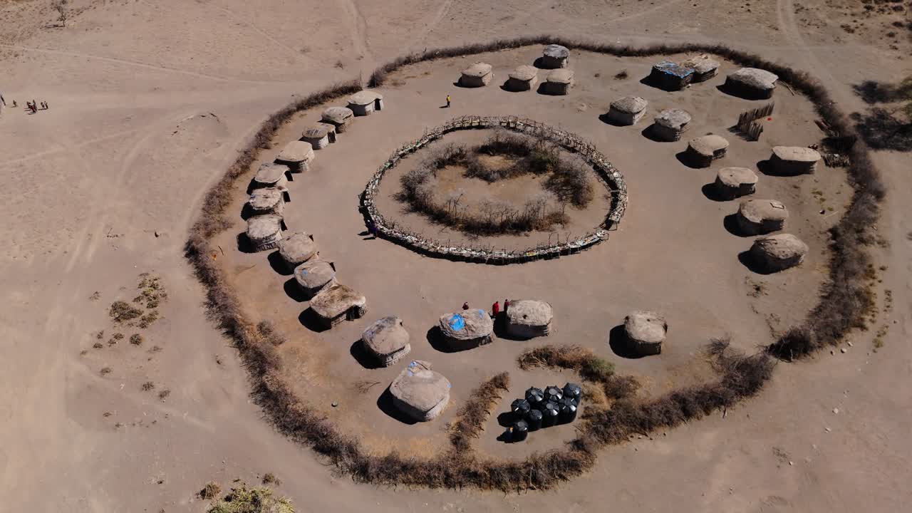 city scape view of rural settlement of masai. DRONE SHOT OF MASAI VILLAGE NGORONGORO