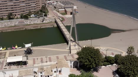 coastal cityscape with bridge and beach