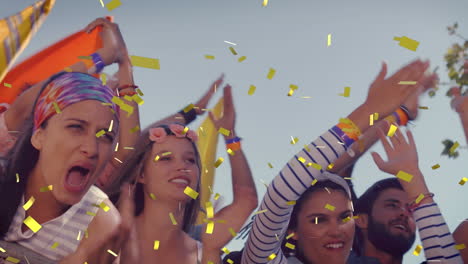 animation of gold confetti falling over people having fun at summer music festival