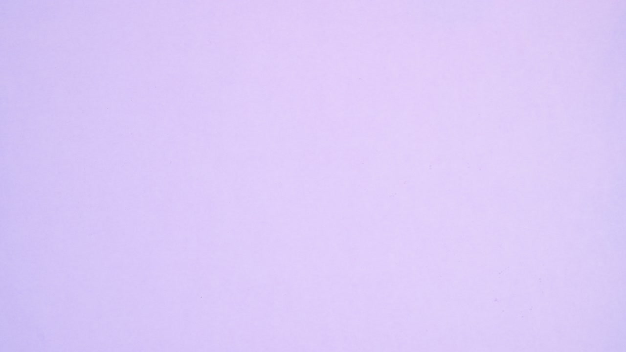 Making cookies groceries appear on left and right side of light purple theme. Stop motion flat lay