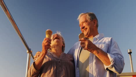 senior couple having ice cream at promenade 4k