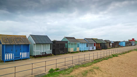 explore mablethorpe from above, revealing beach huts, sandy shores, amusement parks, rides, and the bustling holiday crowd