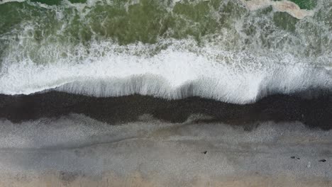 drone 4k footage of a rocky beach in lima, peru