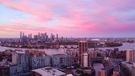 establishing wide angle drone shot of london skyline at sunset, england