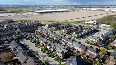 Drone-circling-over-edge-of-Milton-neighborhood-next-to-farmer's-fields