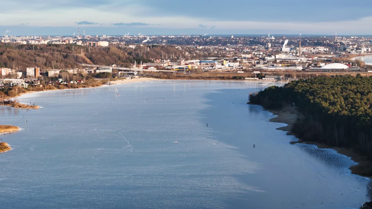 Frozen Lampedziai lake of Kaunas in winter season, aerial view