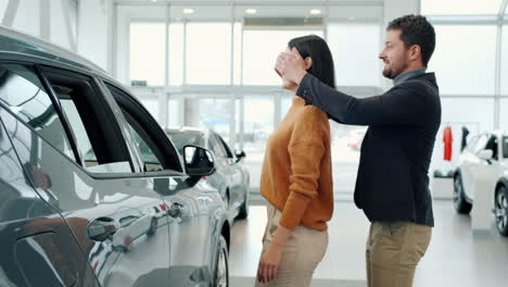 couple excited about new car purchase