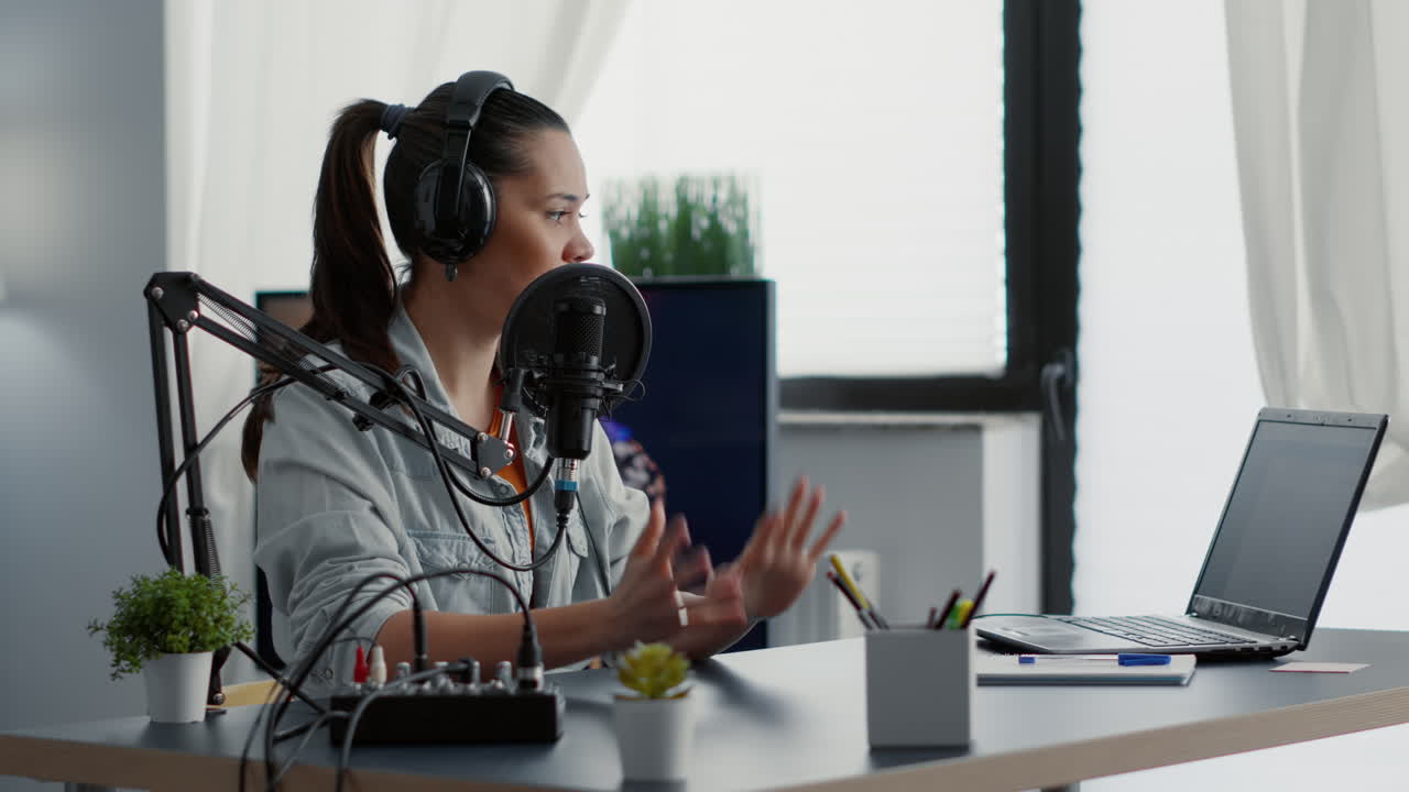 Creative content creator in studio getting ready for internet live podcast