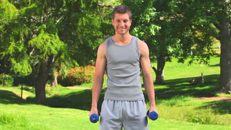 Athletic-man-doing-exercises-outdoors-