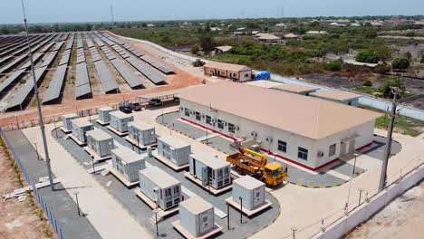 aerial view of lithium-ion phosphate battery energy storage system at electrical power utility solar farm