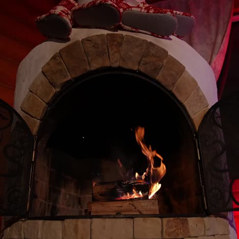 Burning fireplace during Christmas eve. Background for the design of New Year greetings