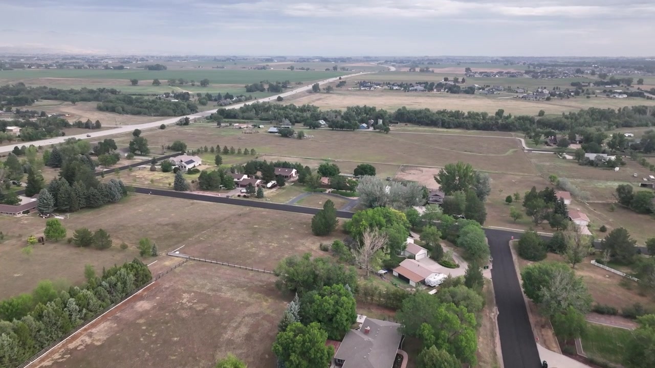 See how Broomfield redefines suburban density with this stunning aerial look at custom homes boasting exceptional square footage and massive backyard properties.