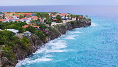 powerful storm waves crash in historic swell against cliffs on caribbean island