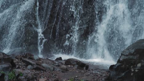 waterfall crashes into the river