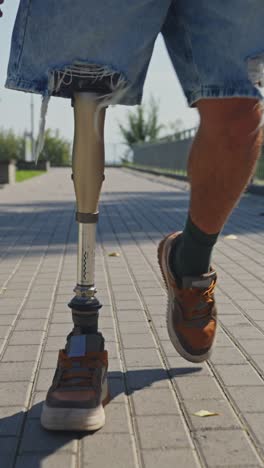 person with prosthetic leg walking
