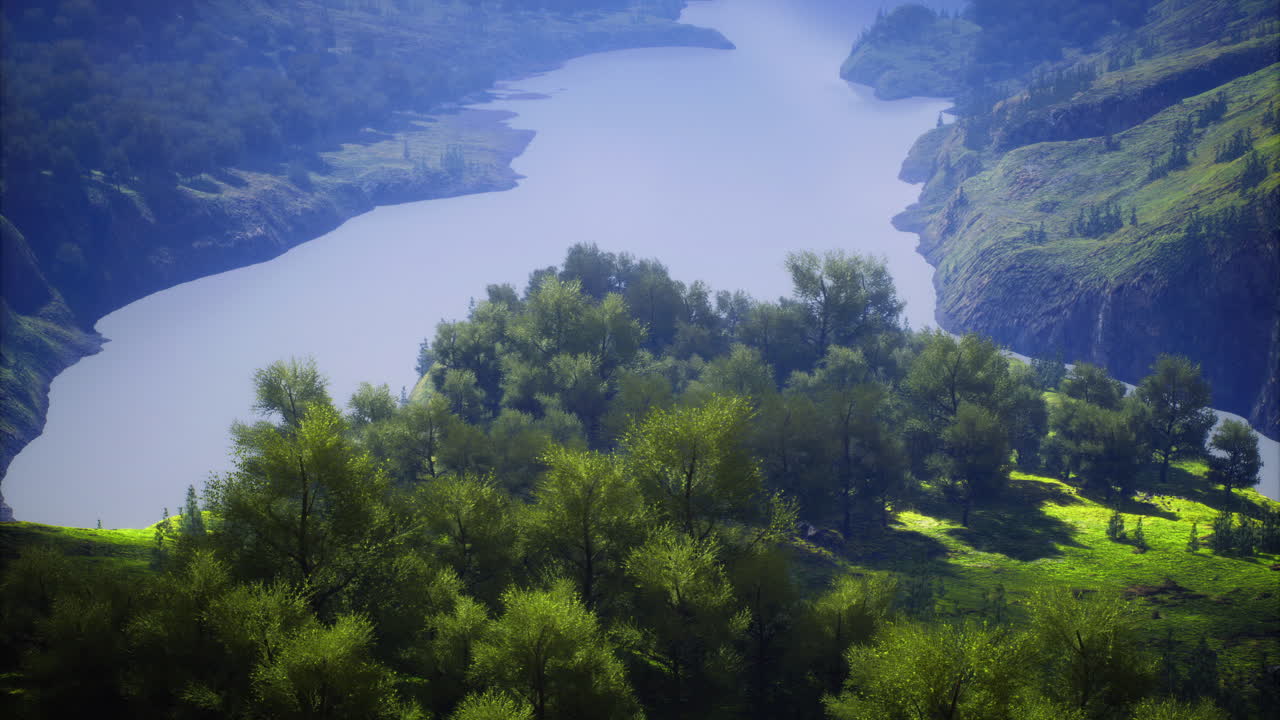 Natural beauty along a tranquil river in a lush green valley during midday