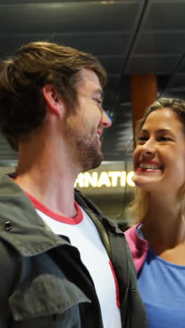 couple interacting with each other while walking