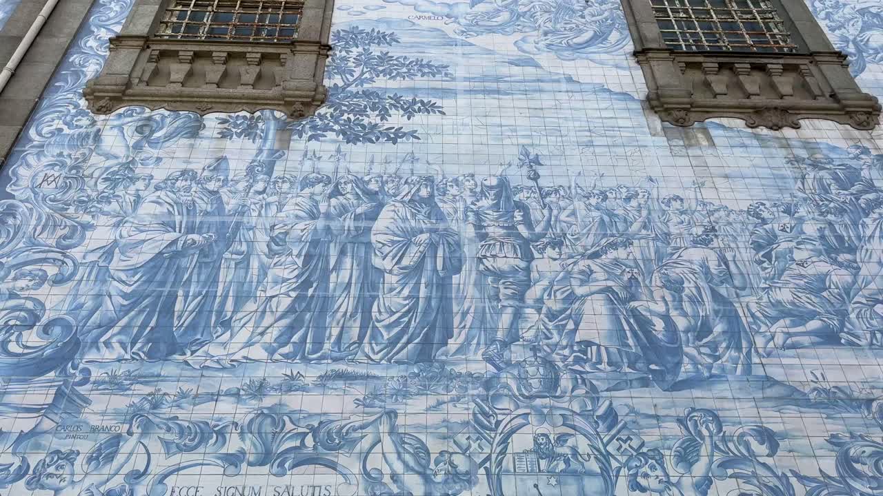 Ornate azulejo tiles on wall of Igreja do Carmo in Portugal.
