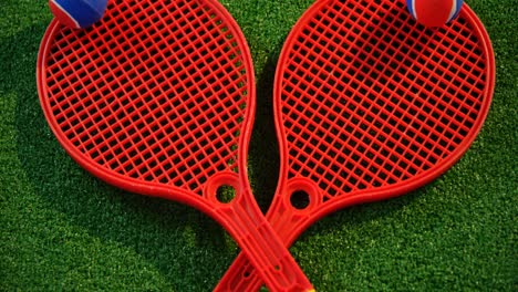 tennis balls and racket in court 4k
