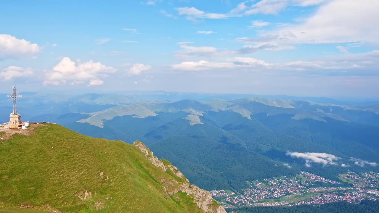 Panorama view of the Bucegi mountains, city and skyline in Busteni, Romania