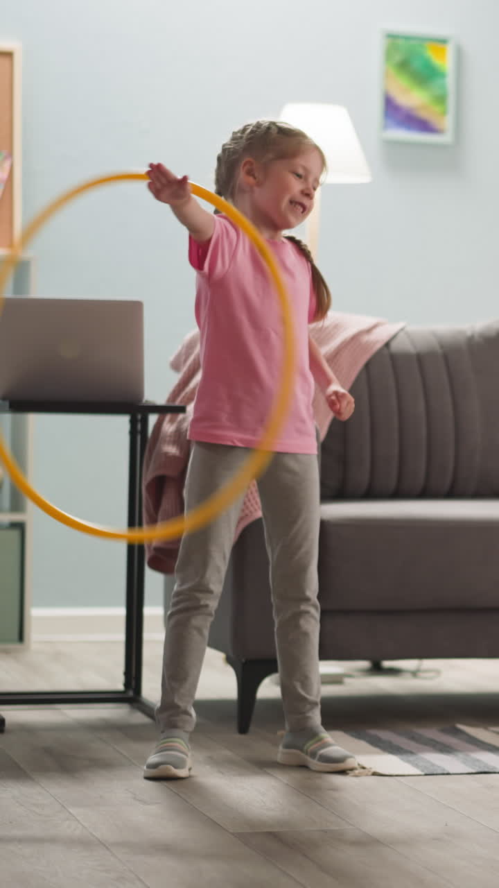 blond hair children relaxing in bright room, smiling girl is spinning hula hoop, boy is sitting in armchair eating sandwich, indulge, home interior, kids at home