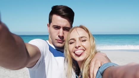 couple in love enjoying free time on the beach together