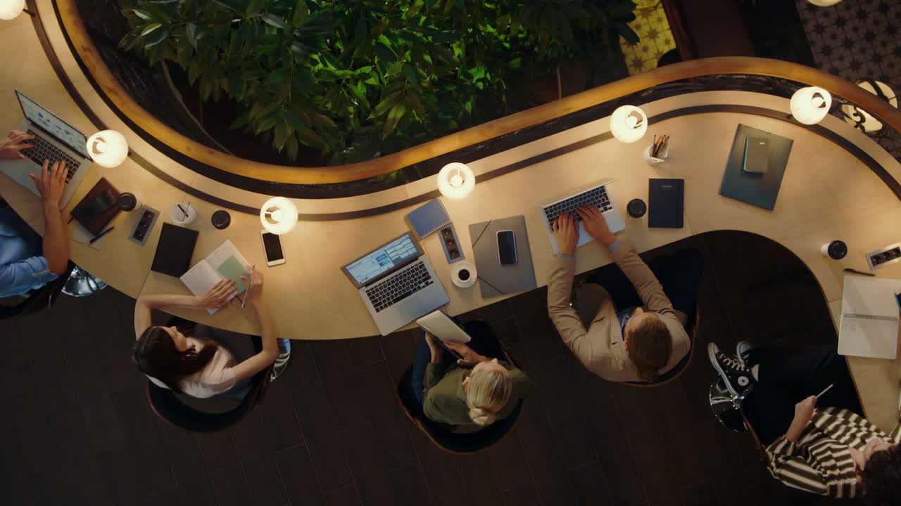 People discussing project in coworking. Creative team working overtime in office