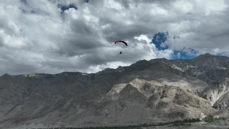 motor glider flying in beautiful weather in mountain region of pakistan enjoying the weather