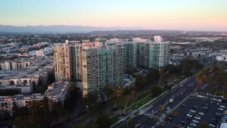 new modern apartment or condo building on city skyline in america