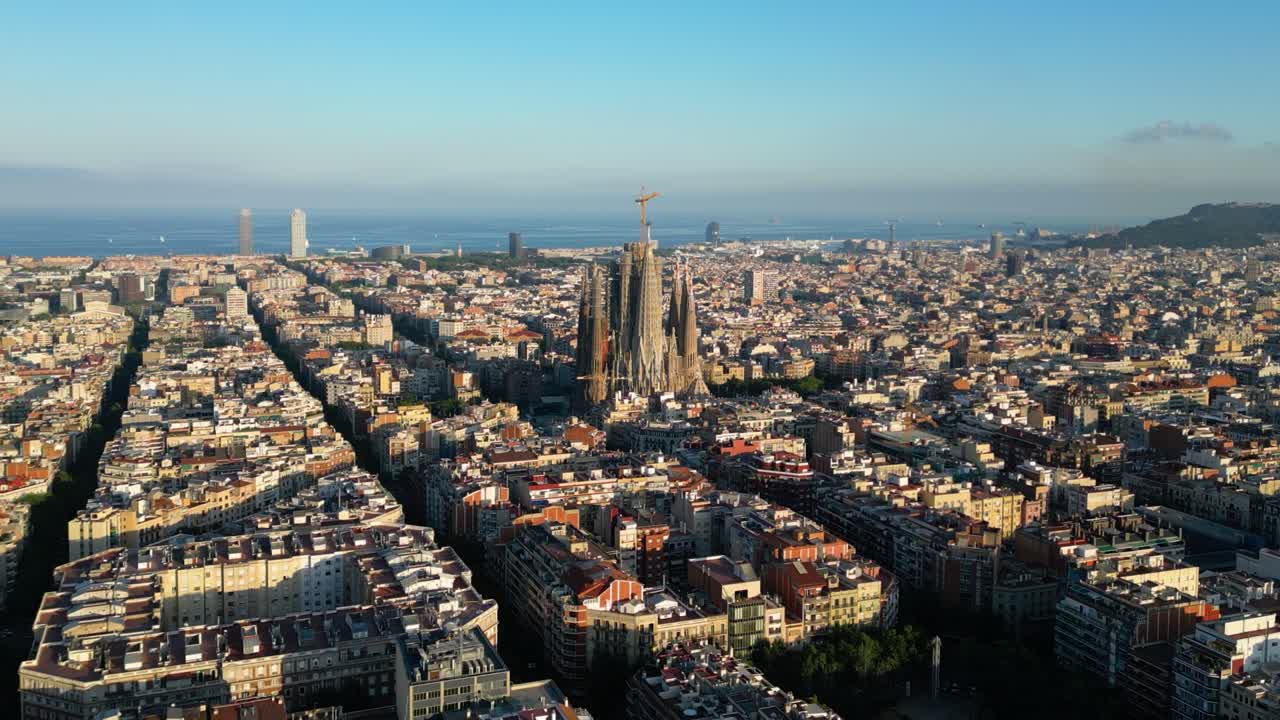 Barcelona skyline with Sagrada Familia Cathedral at sunset. Catalonia, Spain
