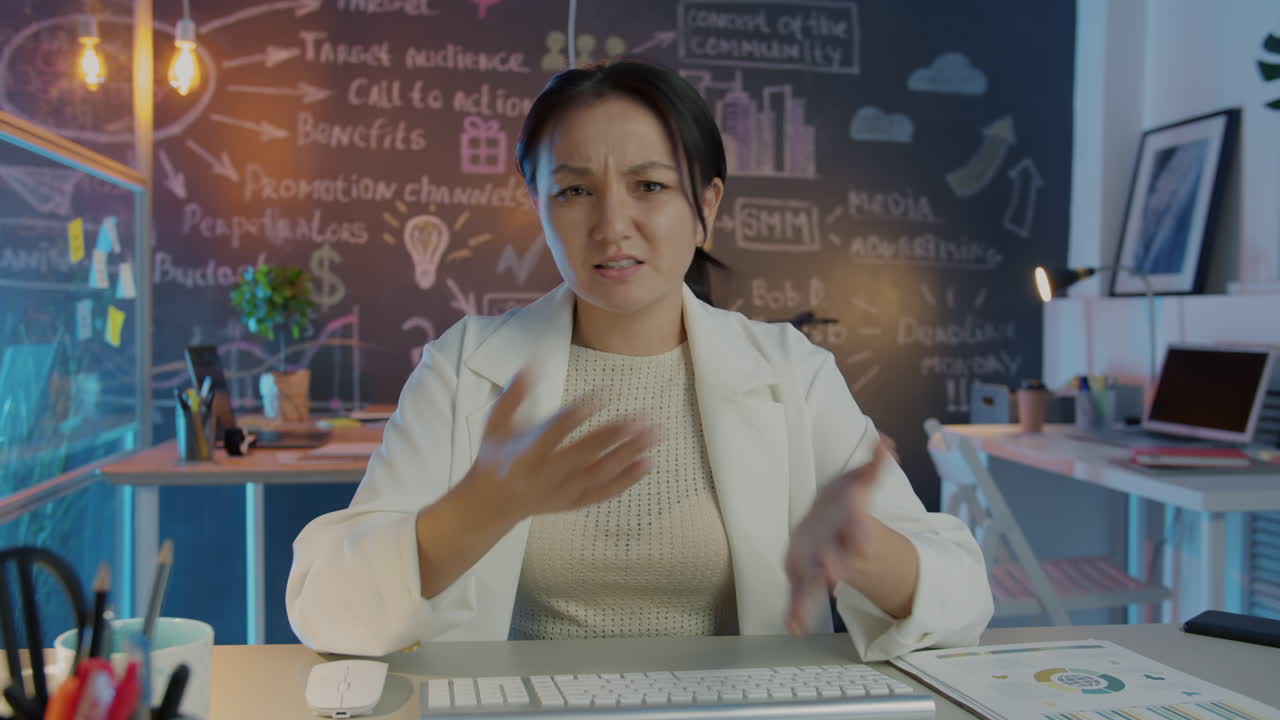 Business Woman Explaining a Concept in a Virtual Meeting