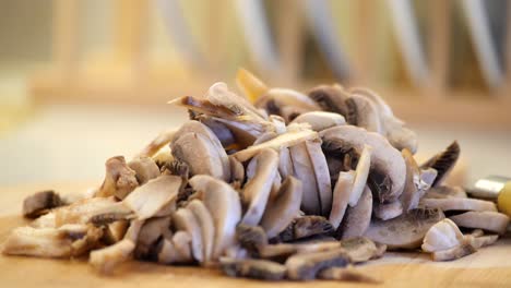 sliced mushrooms on cutting board