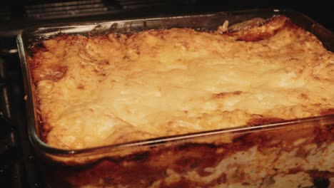 italian lasagna resting after being cooked in the oven