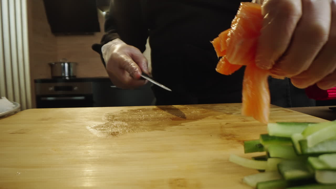 Chef Preparing Fresh Salmon and Vegetables for Sushi